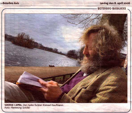 Dr. Konrad Kaufmann Picture of Dr. Konrad Kaufmann reading a book near a river.